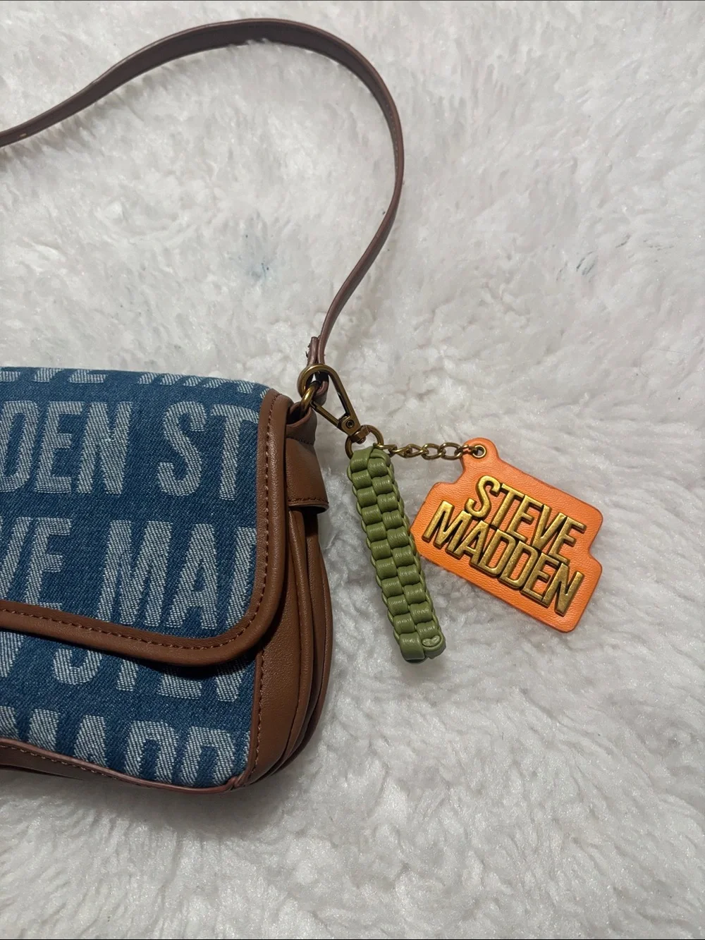 Steve Madden Blue Logo Denim Crossbody with Tan Trim and Orange Charm